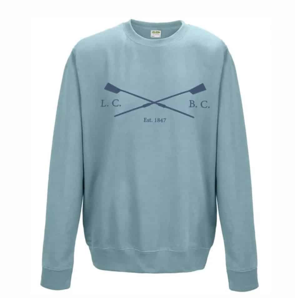 A light blue sweatshirt with crossed-oars logo of the Lincoln College Boat Club (LCBC), established in 1847