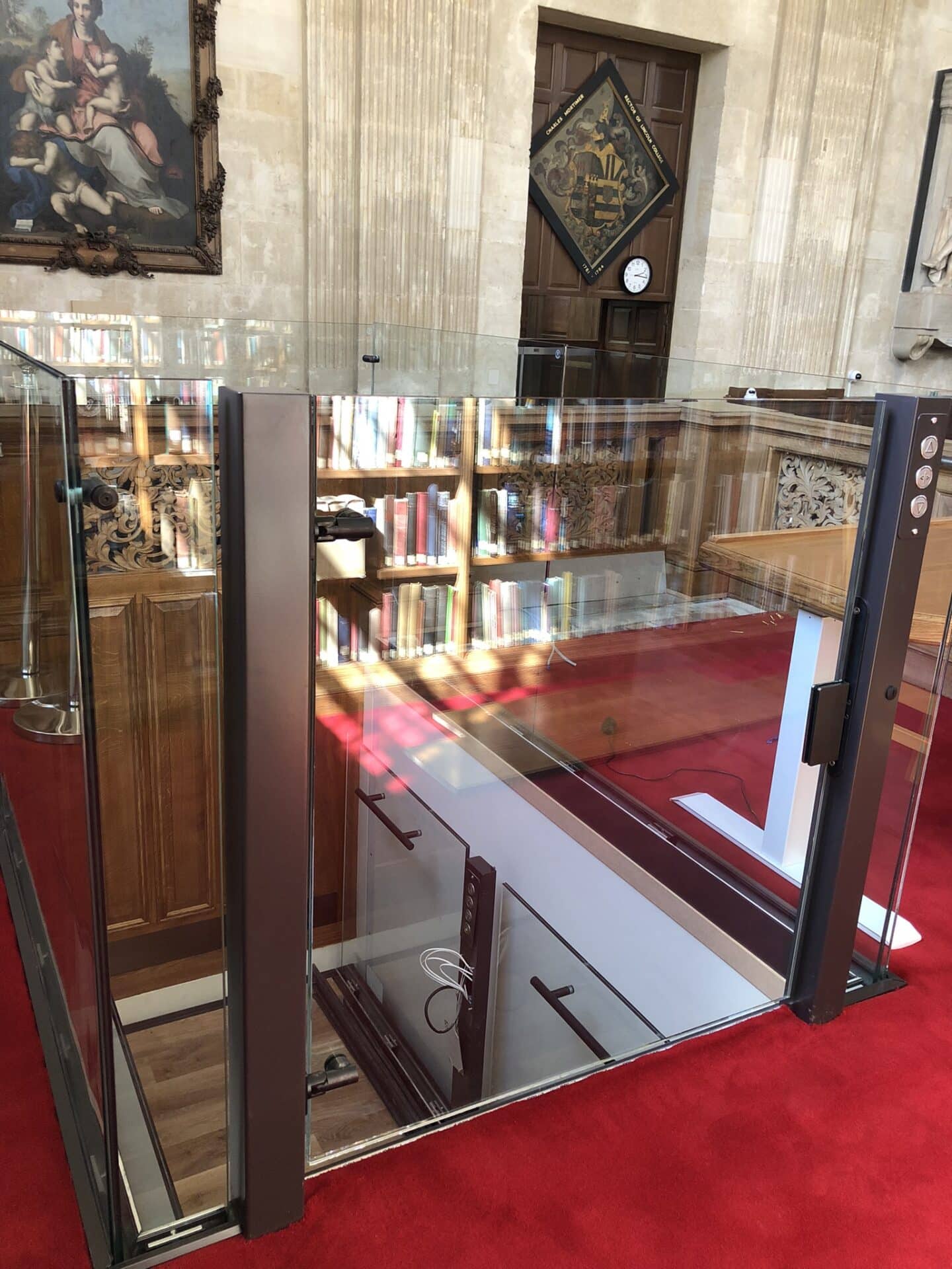 Libary lift shaft surrounded by glass walls