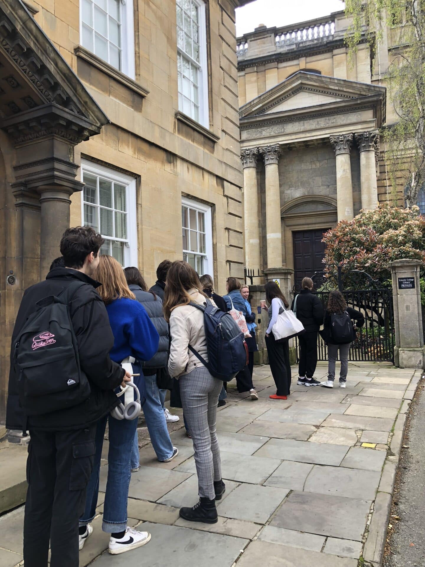 Queue of students in front of the Library