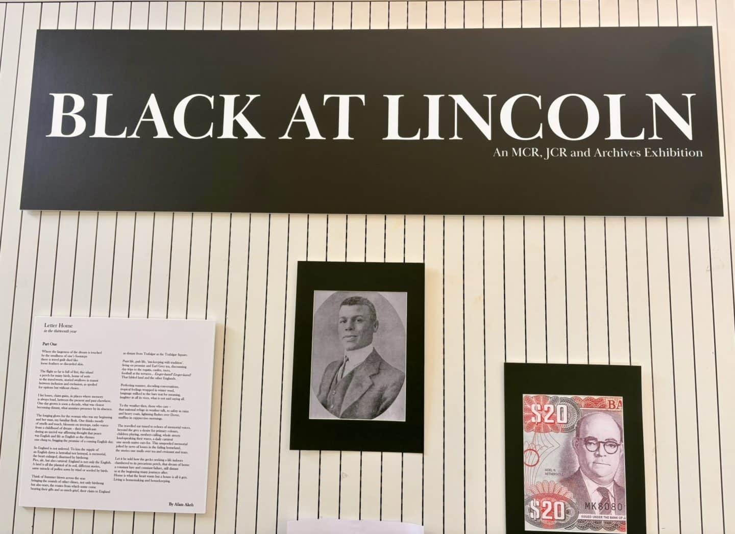 Close-up of the Black at Lincoln exhibition in the Berrow Foundation Building, showing the large black-and-white exhibition title panel above archival material, a historic portrait and an image of a banknote displayed on the wall.