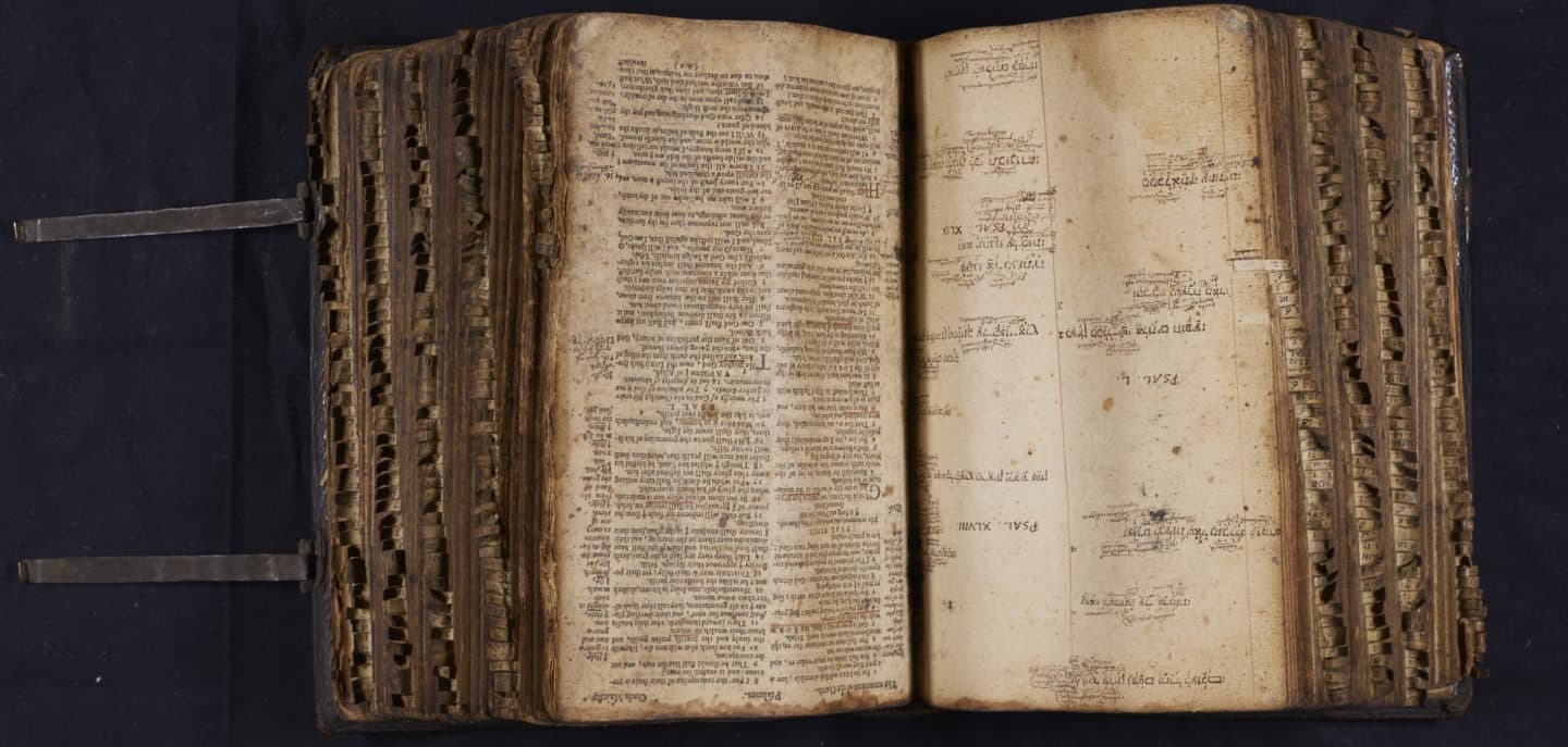 Open copy of the 1634 King James Bible, indexed with tabs and interleaved so he could make annotations in Hebrew, Latin and Greek.